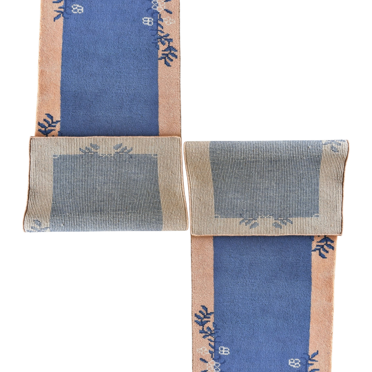 Set of 2 knotted wool rug with blue and beige design on a white background
