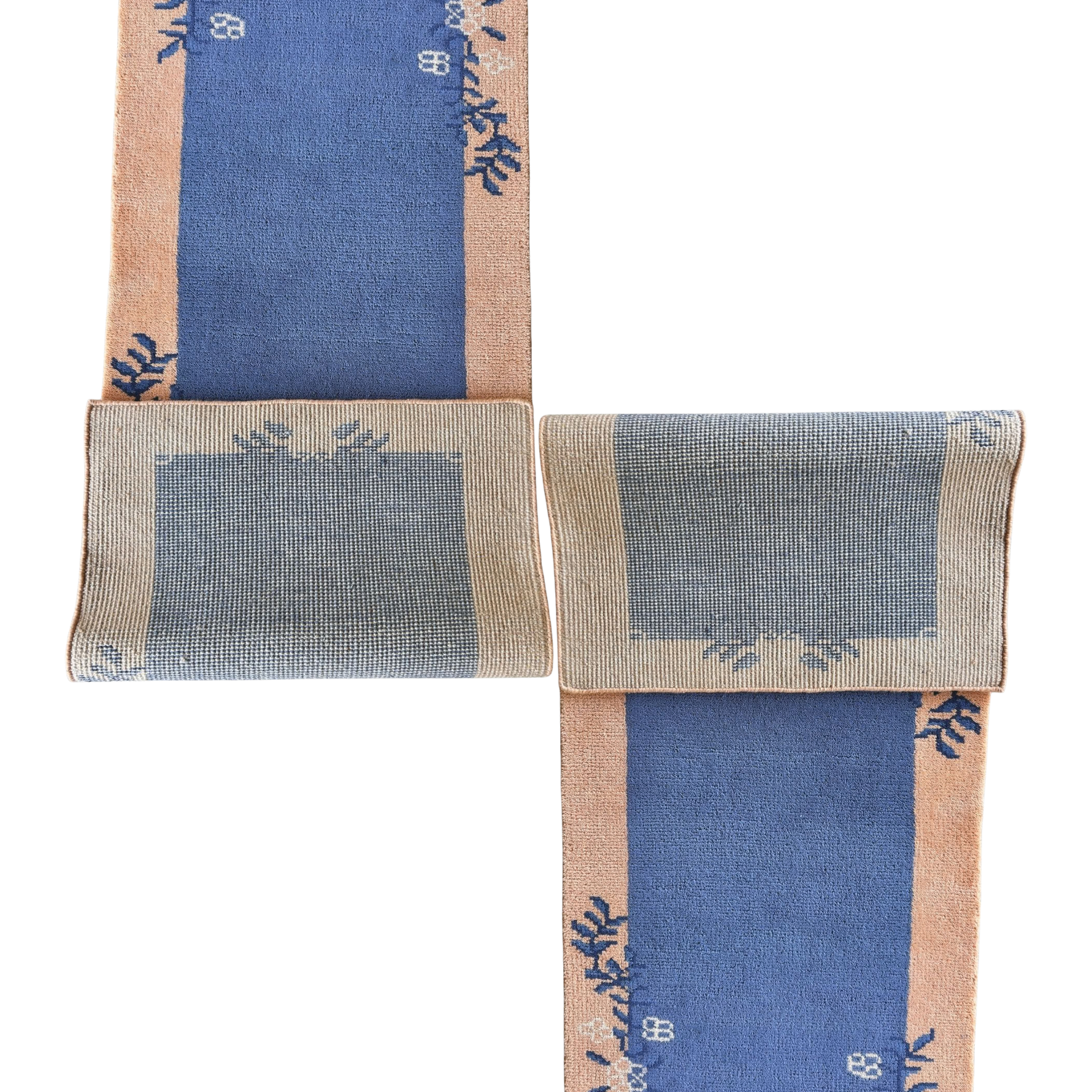 Set of 2 knotted wool rug with blue and beige design on a white background