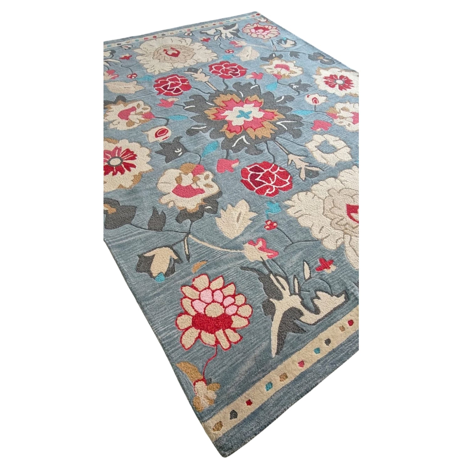 Floral patterned rug on a white background