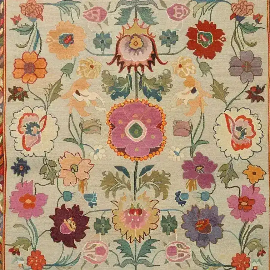 This vibrant area rug features a colorful, hand-knotted floral design reminiscent of vintage Persian rugs. Ideal for adding a splash of color to your living room, the intricate patterns and rich hues make it a standout piece among area rugs for living room settings.