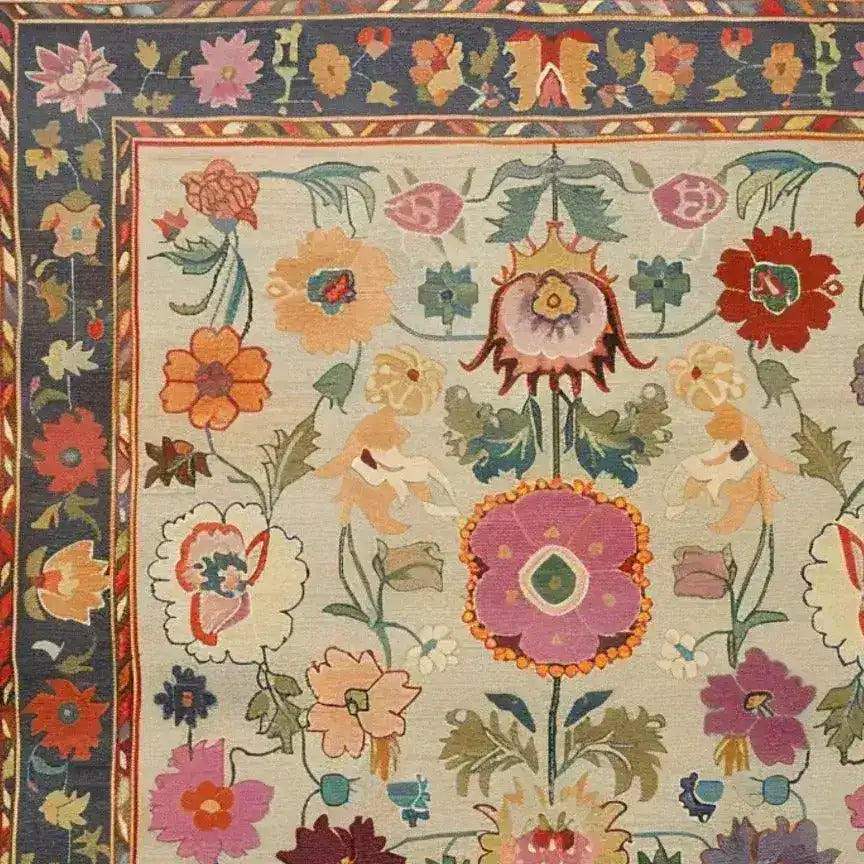 A vibrant, hand-knotted area rug featuring a colorful floral design, perfect for adding a touch of vintage elegance to your living room. This Persian-style rug showcases intricate patterns with blooming flowers in rich, warm colors, ideal for those seeking unique rugs for living room decor.