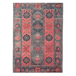 The Crimson Dreams Hand Tufted Area Rug features a stunning vintage design with rich red and blue patterns, perfect for large living rooms. This wool rug showcases intricate floral motifs and adds a touch of elegance and warmth to any space.