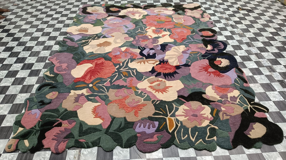 Floral patterned rug on a checkered floor