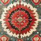 Crimson and Turquoise Hand Knotted Area Rug