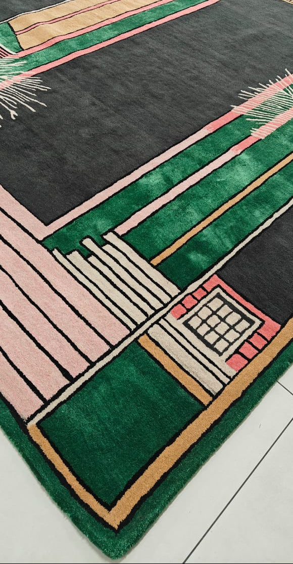 Colorful geometric-patterned rug on a wooden floor