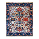 Dreamy Floral Escape Hand Knotted Wool Rug featuring a vibrant floral design. This large area rug showcases intricate Persian patterns in rich blues and reds, perfect as a dining table rug in a dining room. Ideal for adding elegance and warmth, this wool rug is a stunning example of dining room area rugs.