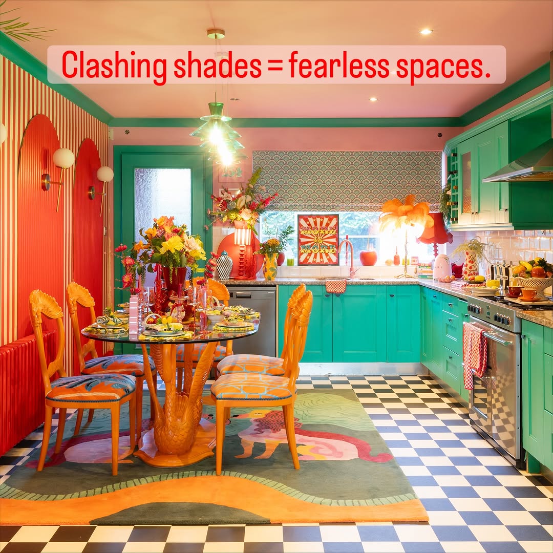 Eclectic colorful kitchen with a green rug of warm-toned animal figures under a dining table