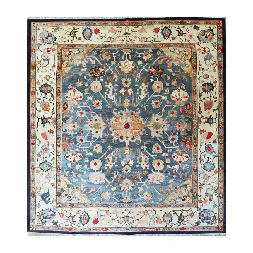 The "Elegant Blue Floral Hand-Knotted Area Rug" showcases a sophisticated floral design in serene blue hues, adding timeless beauty to any room. Hand-knotted for durability, it blends artistry with lasting quality.