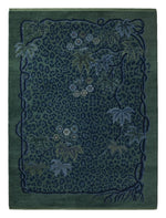 Emerald Leopard Jungle Hand Knotted Rug — green, navy, emerald animal print rug by Maia Homes on a white background