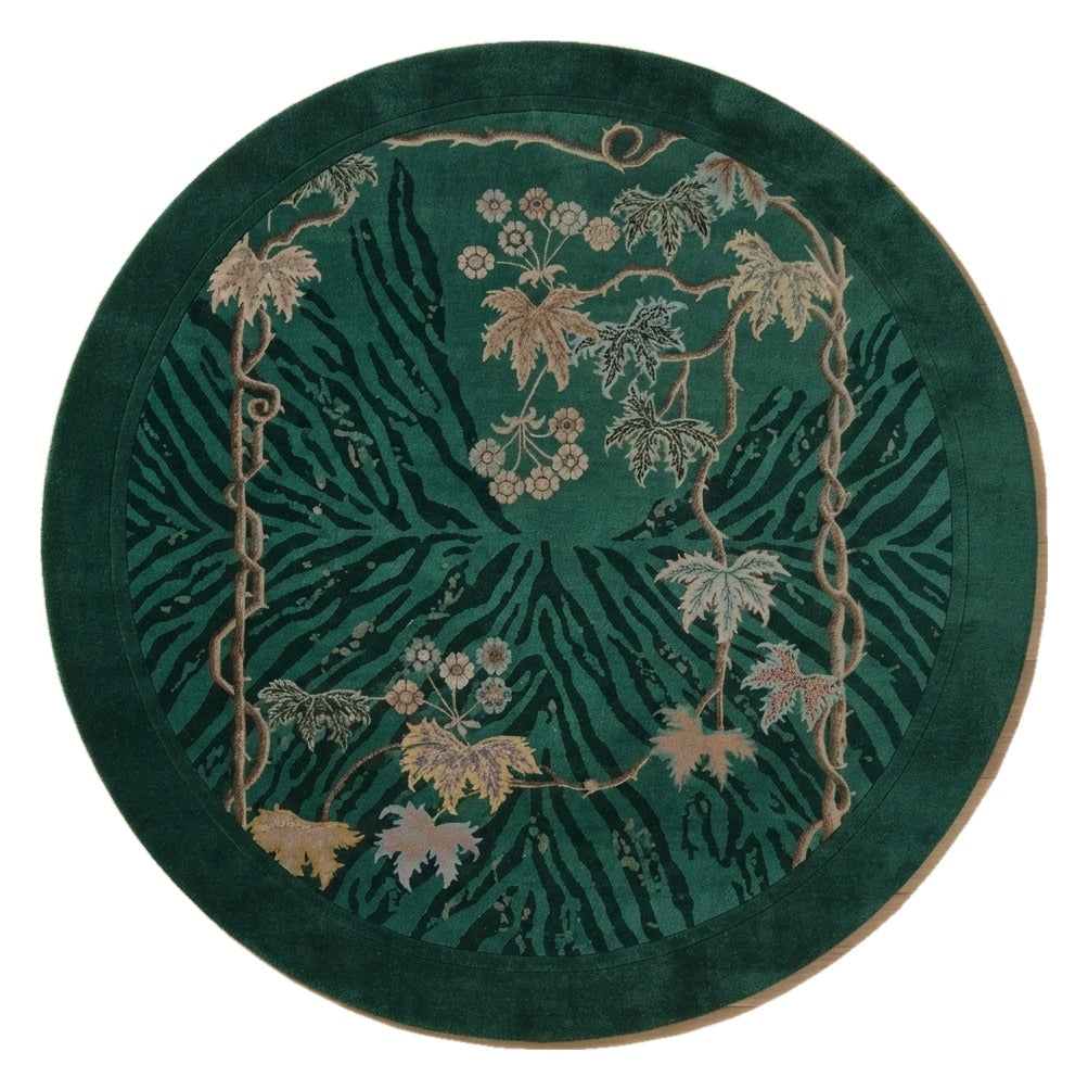 Emerald Tiger Vine Round Hand Tufted Rug — emerald, green, gold animal print rug by Maia Homes on a white background