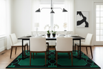 Modern dining room with a black table and white chairs on a green patterned rug.