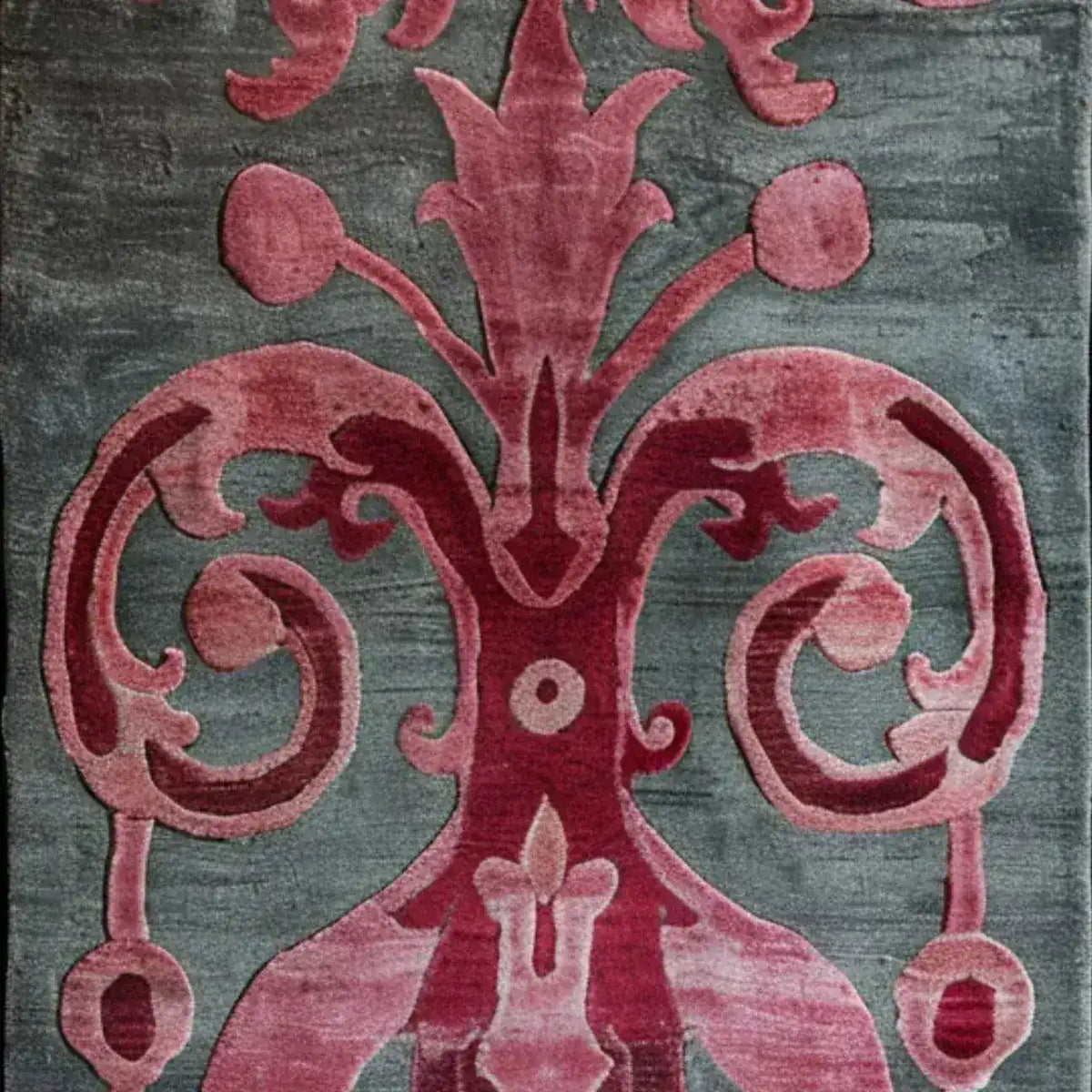 Close-up view of a Floral Damask Hand Tufted Wool Runner Rug featuring intricate pink and red patterns on a gray background. Perfect for enhancing spaces as an area rug, kitchen runner rug, or large living room rug. Ideal for adding elegance to your hallway or bathroom.