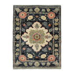 Floral Legacy Medium Hand Knotted Wool Rug featuring an intricate Persian design with vibrant floral patterns. Ideal for adding elegance to any living room or office, this area rug showcases a harmonious blend of colors, perfect as a centerpiece for living room area rugs.