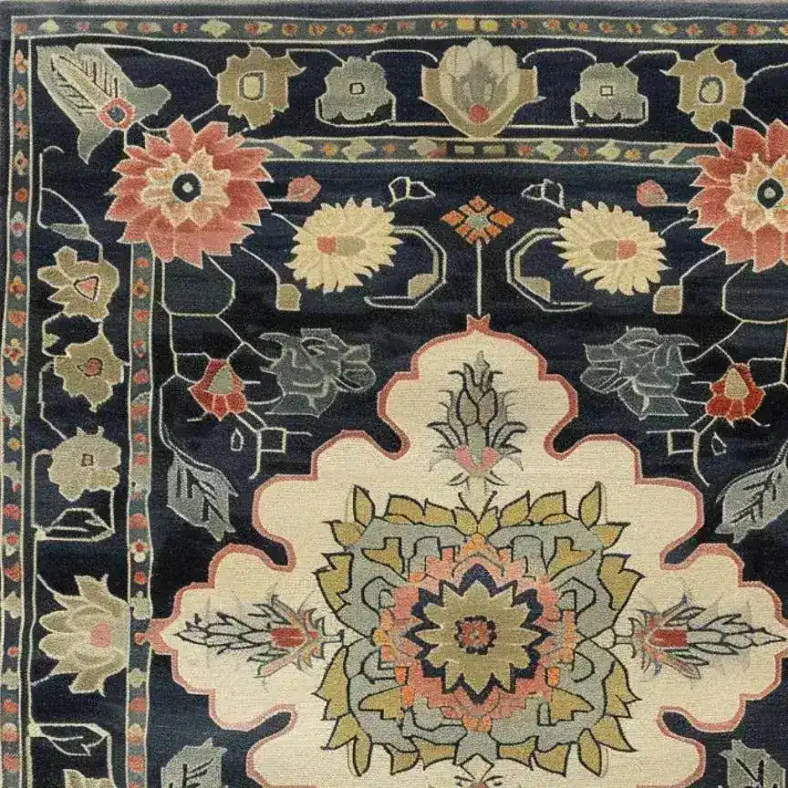 Close-up of a Floral Legacy Medium Hand Knotted Wool Rug showcasing a vibrant and intricate Persian design. Ideal for enhancing the elegance of your living room or office, this area rug features bold floral patterns with rich colors, perfect as a centerpiece in any living room area.