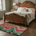 Wooden bed with floral bedding in a bedroom setting in front of a rug