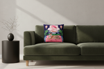 A square decorative throw pillow with a colorful tropical flamingo and tiger print, styled on a cream-colored fabric slipcovered sofa against a textured beige wall and light wood floor.