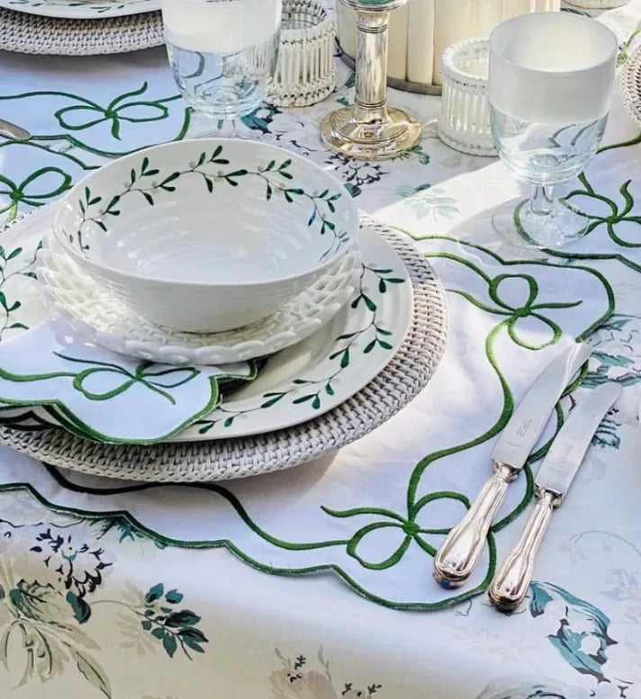 Gardenia Grace Placemats. These charming placemats feature a delicate floral pattern inspired by the blooming gardenia, adding a touch of elegance and serenity to your dining table.