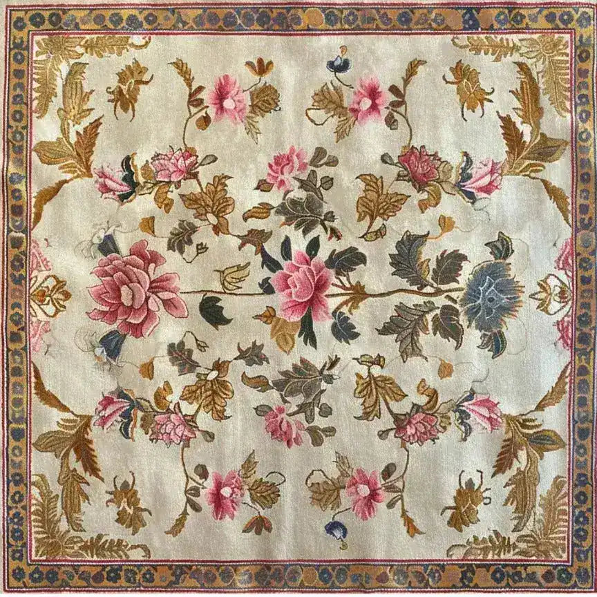 Elegant Golden Glory Square Hand Tufted Wool Rug featuring a vibrant floral design, perfect as a large living room rug or a stylish addition to any bedroom. This luxurious square area rug showcases intricate patterns with pink and blue flowers, enhancing the charm of your living space.