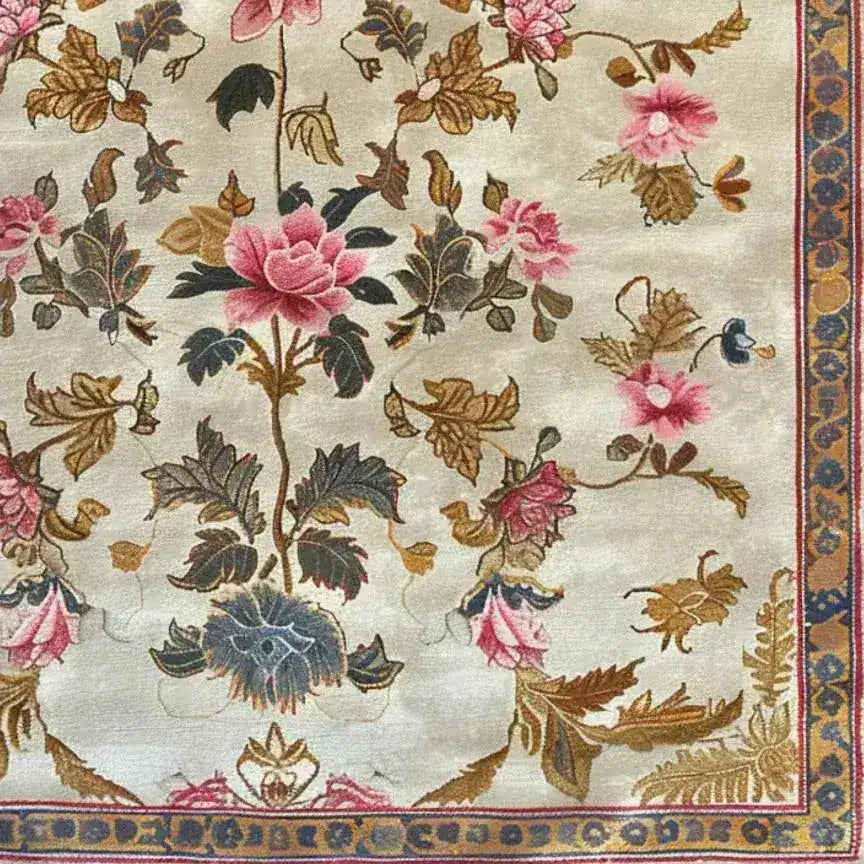 Elegant Golden Glory Square Hand Tufted Wool Rug featuring a detailed floral design with pink and blue flowers, ideal for a bedroom or large living room. This square area rug adds a touch of luxury and warmth, perfect for enhancing any living room space.