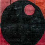 Close-up view of a Graphic Grid Hand Tufted Wool Runner Rug featuring an abstract design with a large black circle and a smaller red circle on a warm red background. Perfect for adding a contemporary touch to your office or kitchen as a stylish area rug.