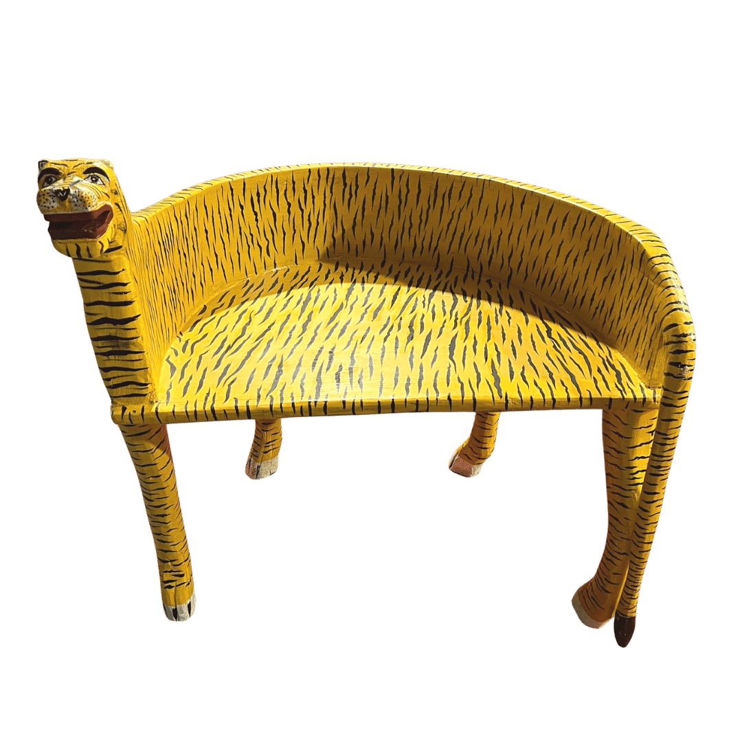 The Hand Crafted Wooden Tiger Maharaja Chair in Yellow is a stunning piece of furniture, meticulously crafted by skilled artisans. Featuring a regal tiger motif carved into the backrest and a vibrant yellow hue, this chair adds exotic elegance to any room. With its curved armrests and spacious seat, it combines style with comfort, making it a perfect statement piece for your living space.