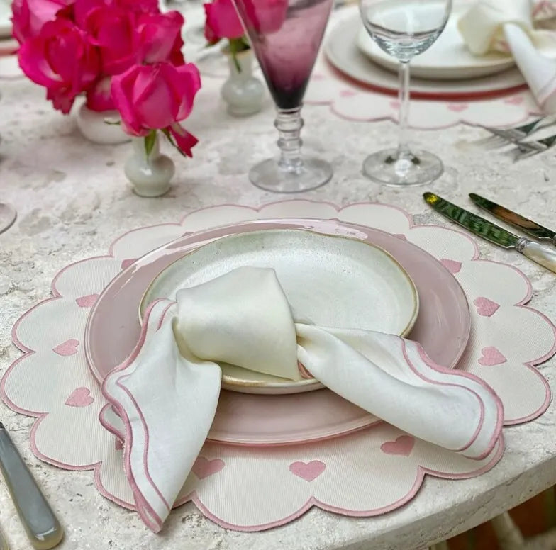 Heartfelt Haven Placemats. These charming placemats feature a heart-shaped design, adding a touch of love and comfort to your dining table.
