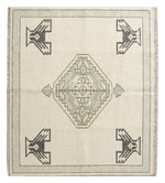Ivory Thunderbird Hand Knotted Rug shown flat on a white background