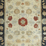 Ivory Elegance Hand Knotted Area Rug