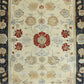 Ivory Elegance Hand Knotted Area Rug