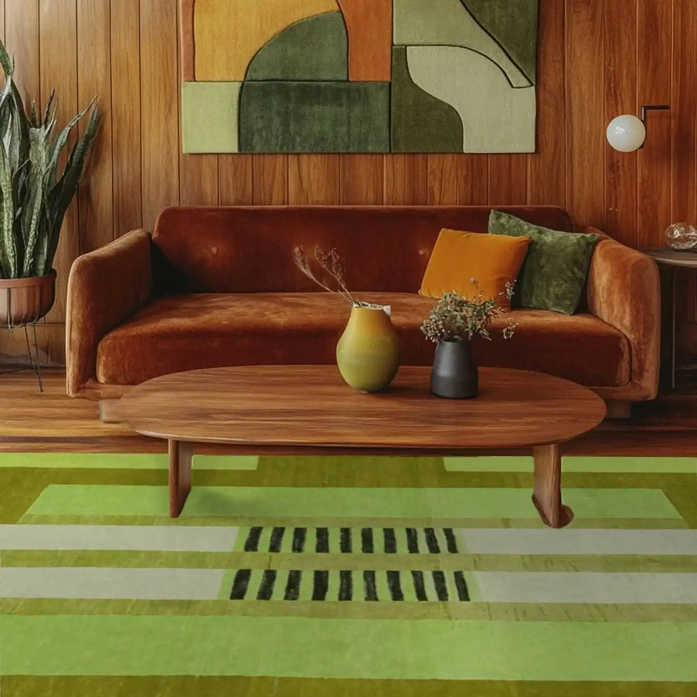Stylish living room featuring a large green area rug with abstract design, perfect as an office wool rug. The space includes a wooden coffee table and a rust-colored sofa, creating a cozy atmosphere ideal for office settings.