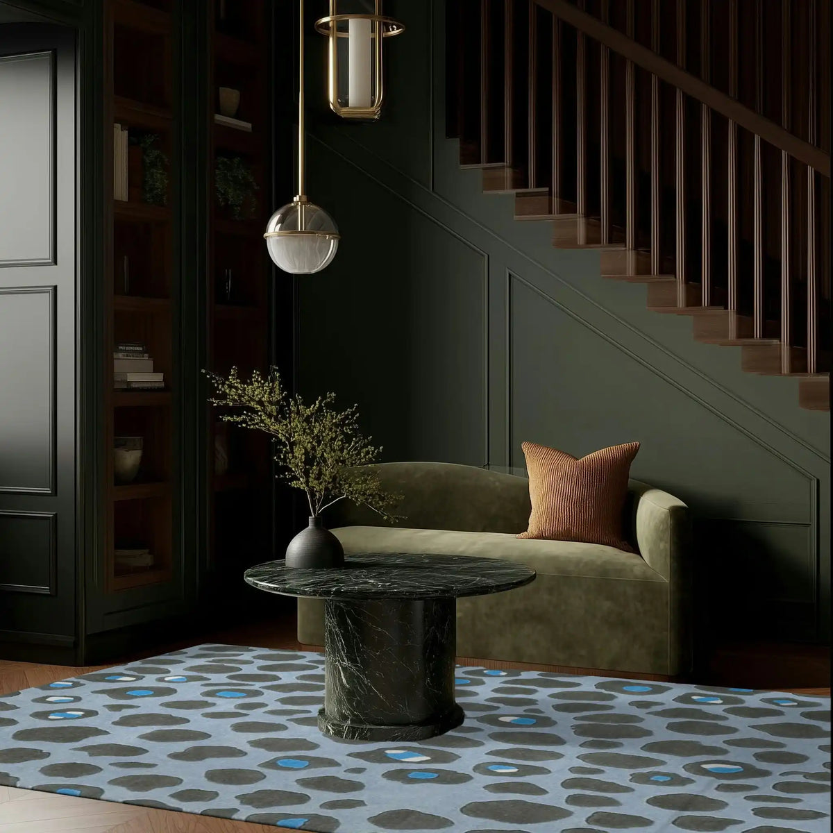 A stylish living room featuring a Blue and Black Leopard Print Hand Tufted Wool Rug. The area rug serves as an elegant foundation for this space, perfect for bedroom rugs or large area rugs for living room settings. The wool rug's abstract design adds a touch of modern luxury, beautifully complementing the dark green sofa and black marble table.