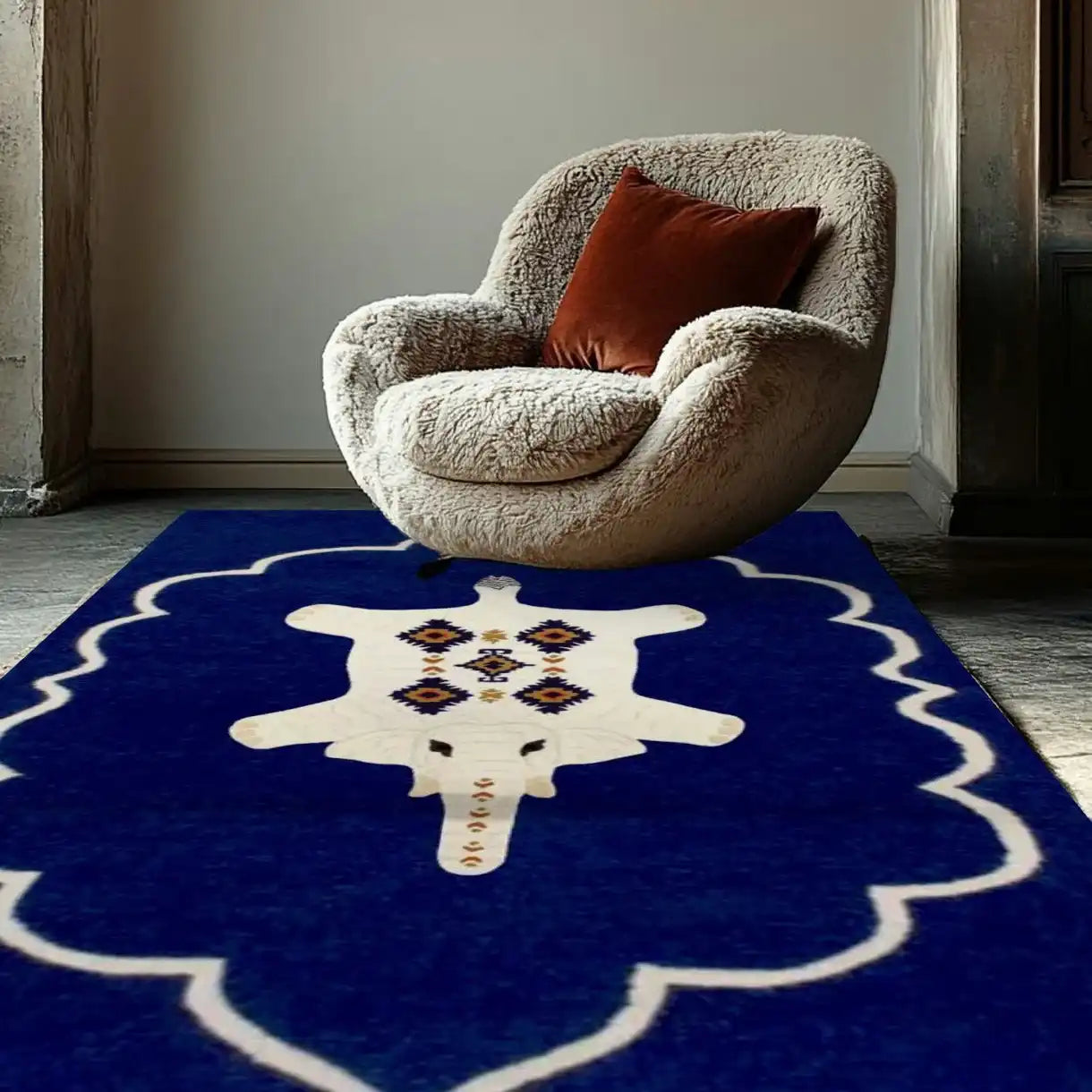A luxurious Bohemian White Elephant Royal Hand Tufted Wool Rug in blue, elegantly placed in a stylish bedroom setting. This large area rug features a unique elephant design, making it a perfect addition to any bedroom decor. Ideal for those seeking a high-quality wool rug for their bedroom.