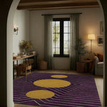 A cozy living room featuring a Burgundy Golden Geometric Hand Tufted Wool Rug. The area rug, with its eye-catching geometric pattern in burgundy and gold, adds warmth and style to the space. Ideal for those seeking elegant rugs for the living room, this wool rug complements the room's neutral décor and natural lighting.