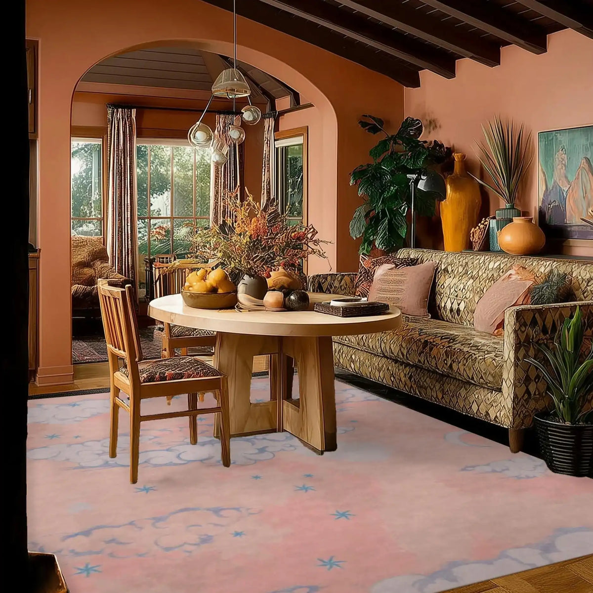 A cozy living room showcasing a Cloud and Star Pink Sky Hand Tufted Wool Rug. This elegant area rug features a dreamy pink sky design with clouds and stars, perfect for adding a soft touch to your living room decor. Ideal for those seeking rugs for living rooms, wool rugs, or vintage rugs, this piece creates a warm and inviting atmosphere.