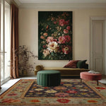 Luxurious living room featuring the Crowned Elegance Hand Knotted Area Rug with an intricate floral design. The rug complements a stylish green ottoman and a vintage sofa, set against a backdrop of elegant drapes and a floral painting on the wall.