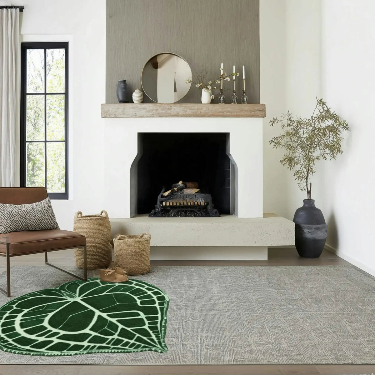 Stylish area rug shaped like an elephant ear, hand-tufted from wool, adding a unique touch to a cozy living room with a modern fireplace. Perfect for bedrooms and dining rooms as a round rug or an accent piece, ideal for those seeking distinctive dining room area rugs.
