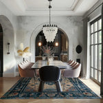 A beautifully styled dining room featuring an elegant floral hand tufted area rug beneath a modern dining table. The intricate wool rug design adds warmth and sophistication, complementing the chic chandelier and contemporary decor. Perfect for dining room settings or as an office centerpiece.
