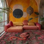 A vibrant Flamingo Fantasy Hand Tufted Area Rug in a cozy living room setting. The rug, ideal for an office or living room, features a detailed flamingo design in rich pink and green hues, complementing the warm tones of the surrounding decor. Perfect for adding a touch of nature-inspired elegance to your space, this wool rug measures 8x10, making it a striking centerpiece.