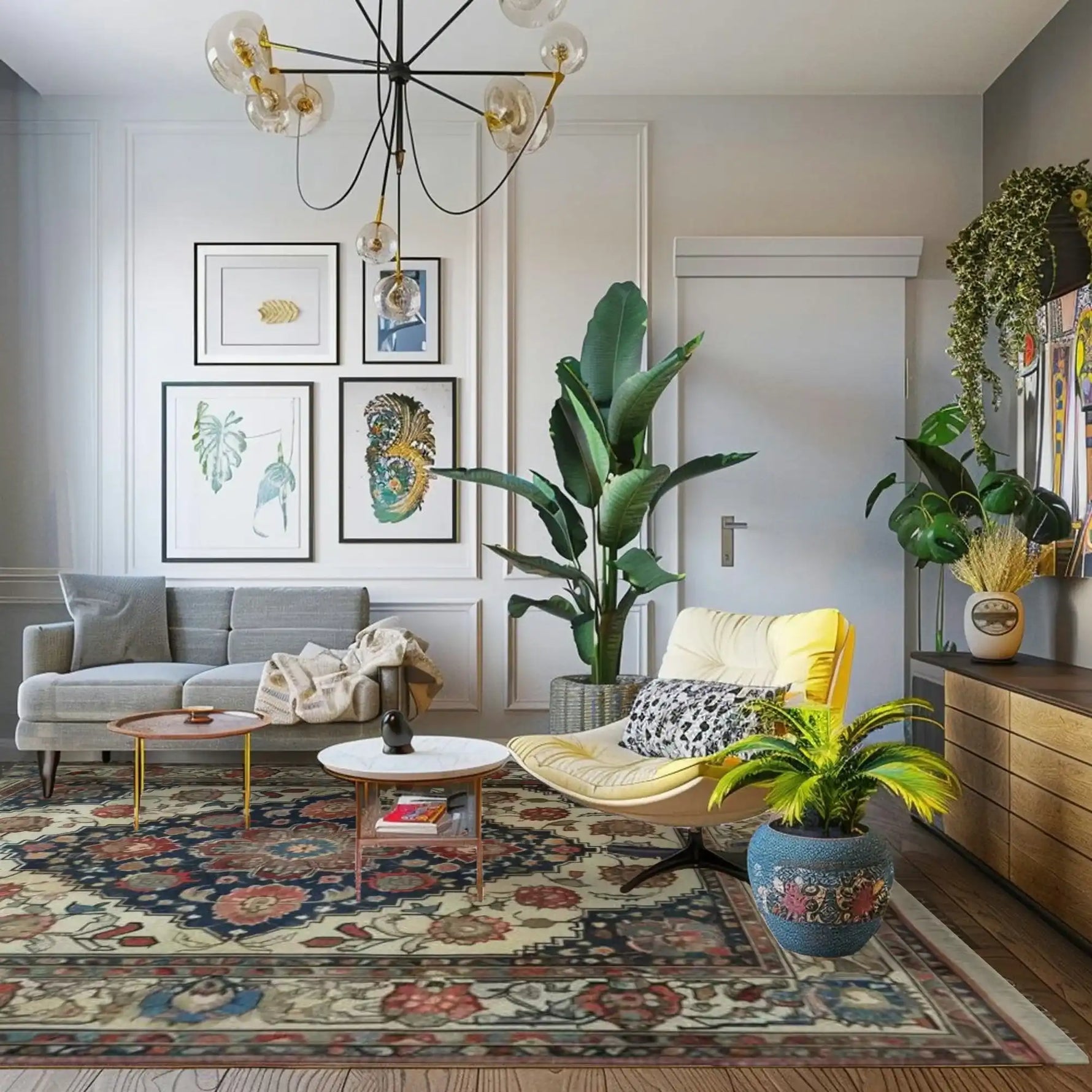 Modern living room with a colorful traditional floral hand knotted rug, gray sofa, yellow chair, and decorative plants.