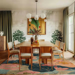 A beautifully designed living room showcasing the Floral Rhapsody Hand Tufted Rug. This area rug adds elegance with its vibrant floral patterns, perfect for enhancing any living room space. Made from high-quality wool, this floral rug complements wooden furniture and brightens up the room with its colorful design.