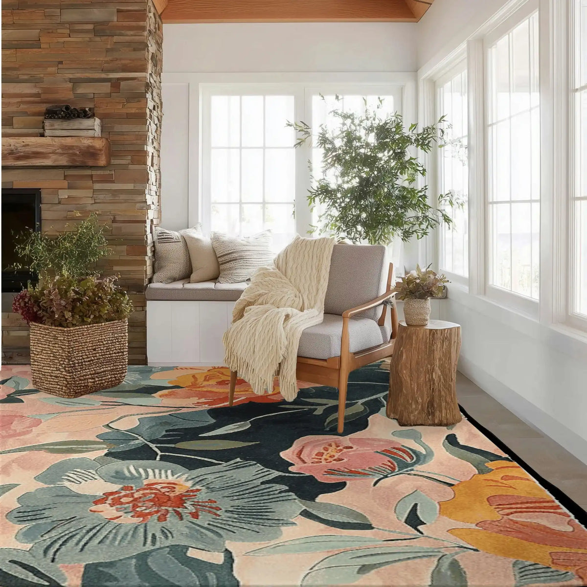 A vibrant floral area rug adorns a cozy living room setting, featuring a hand tufted wool design. This 8x10 living room rug, with its colorful blooms, complements the natural tones of the stone fireplace and wooden furniture, creating a warm and inviting atmosphere.