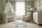Nursery room with crib, rocking chair, zebra rug, and dresser.