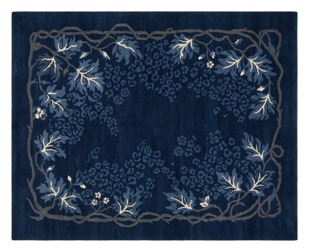 Moonlit Indigo Vine Hand Knotted Rug shown flat on a white background