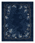 Moonlit Indigo Vine Hand Knotted Rug — navy, blue, white floral rug by Maia Homes on a white background
