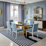 Dining room with blue chairs, glass table, and striped rug.