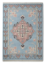 Powder Blue Anatolian Star Hand Knotted Rug — light blue, pink, navy tribal rug by Maia Homes on a white background