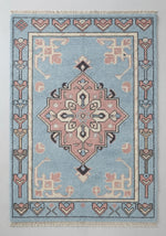 Powder Blue Anatolian Star Hand Knotted Rug — light blue, pink, navy tribal rug by Maia Homes