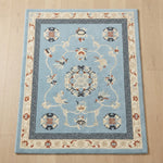 Powder Blue Palace Garden Hand Tufted Rug — light blue, navy, cream chinoiserie rug by Maia Homes