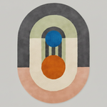 Geometric rug with circular design featuring concentric circles in various colors on a light gray background.
