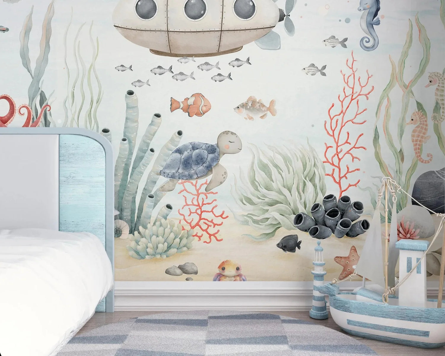 Children's room with an underwater-themed wall mural featuring sea creatures and plants.
